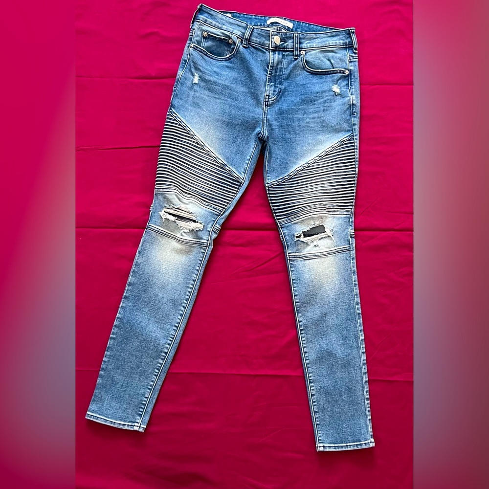Distress denim blue jeans